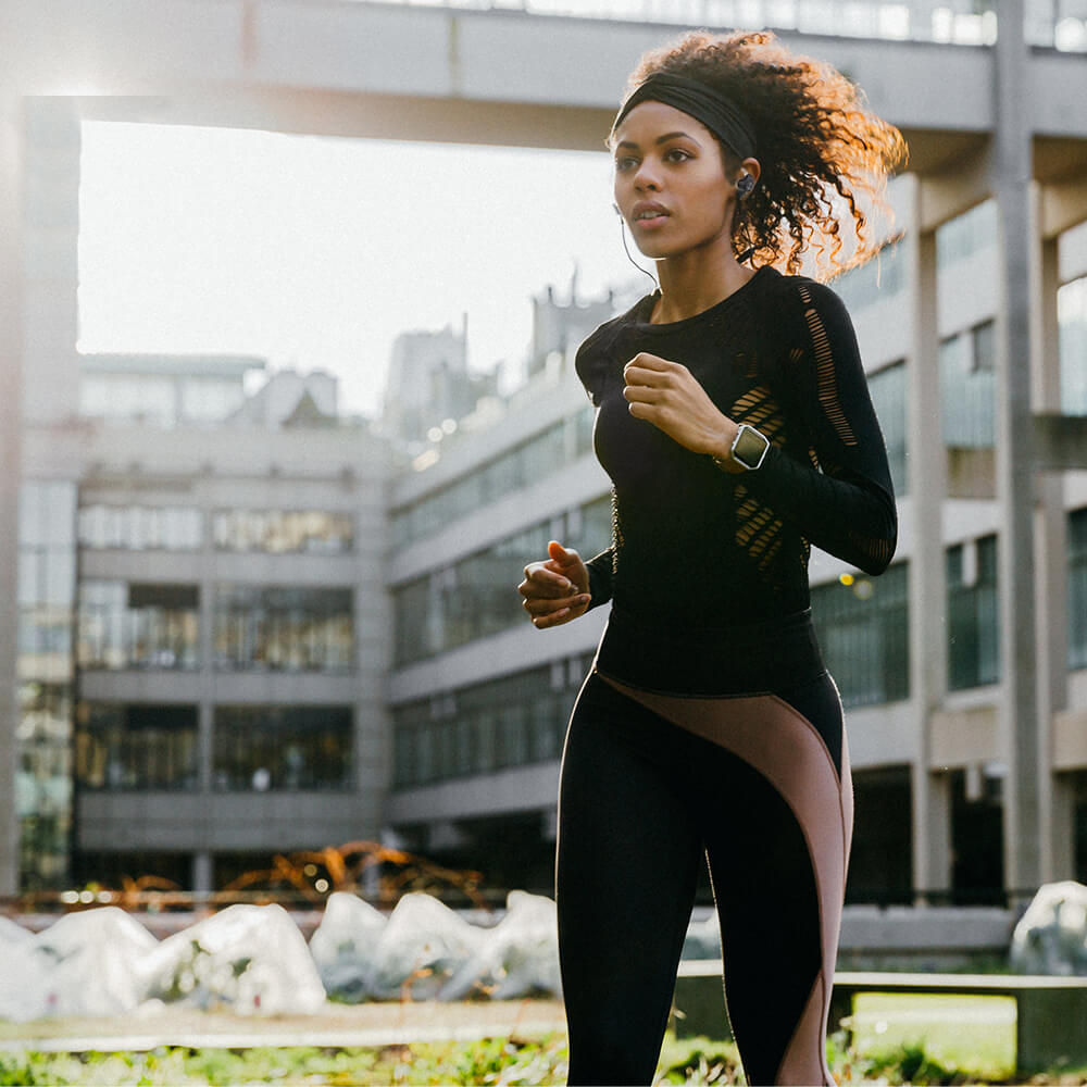 woman jogging with headphones